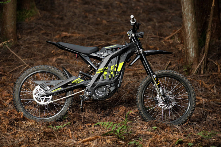Surron Light Bee X electric dirt bike in matte black with off-road knobby tires